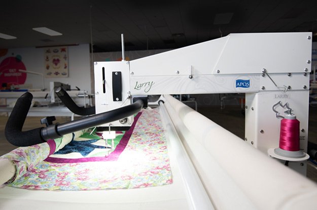 side shot of larry longarm quilting machine