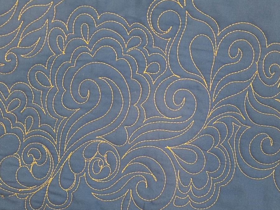 Free motion longarm feathers and swirls