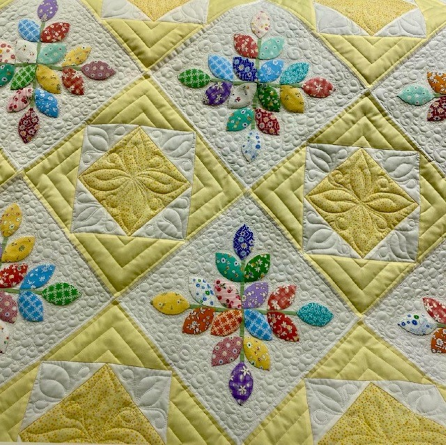 yellow applique quilt
