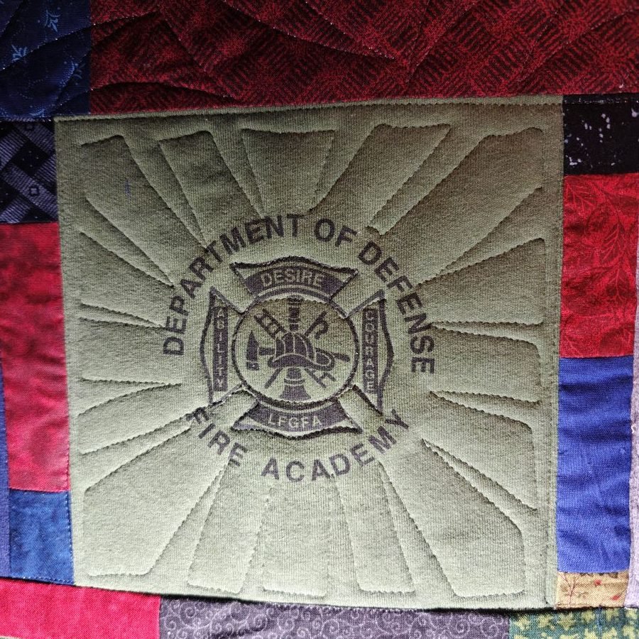 T shirt quilt fills sunburst